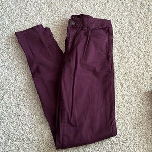 American Eagle maroon skinny jeans